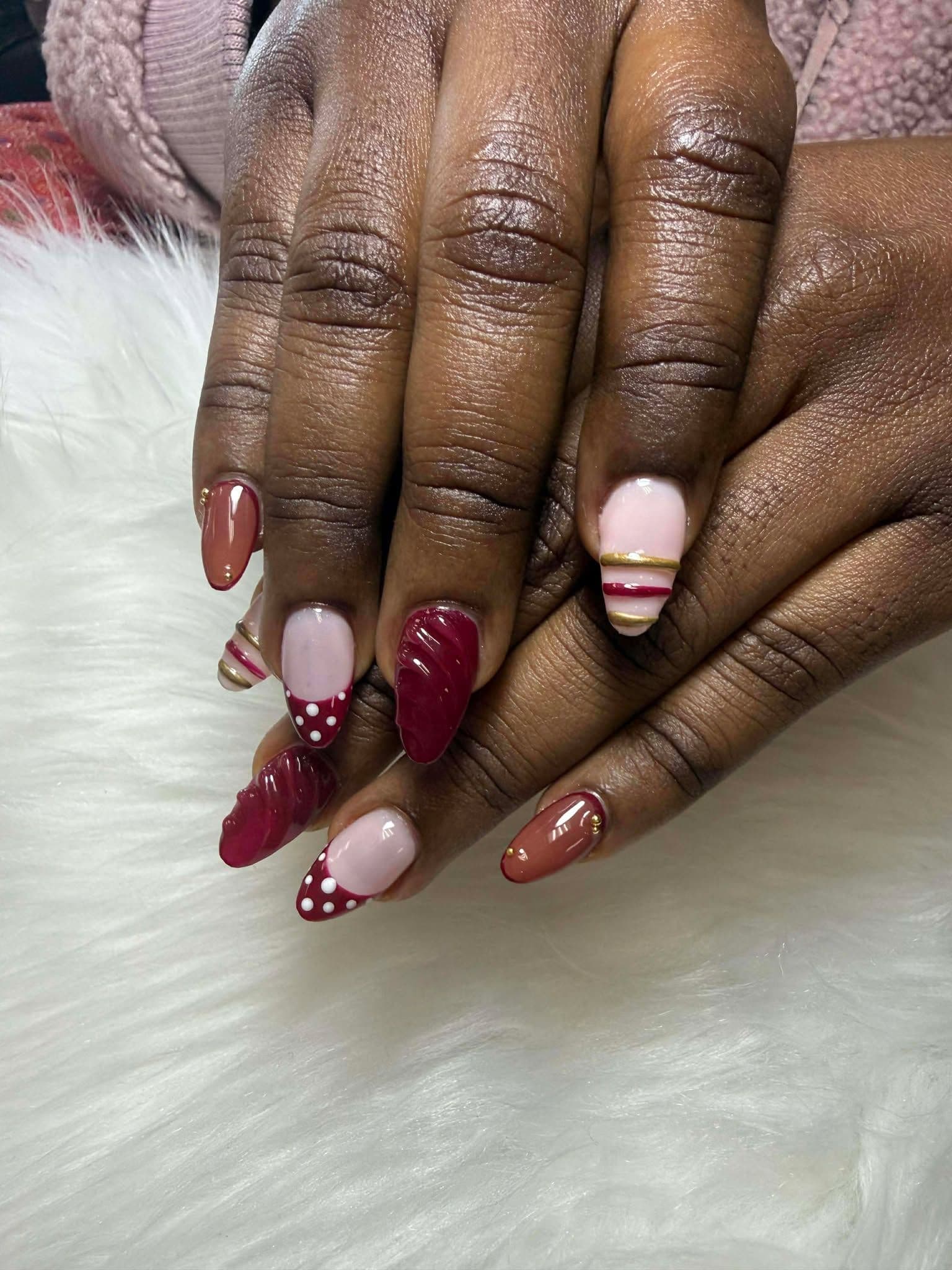 Elegant Burgundy & Blush Nail Art with Zebra Accent